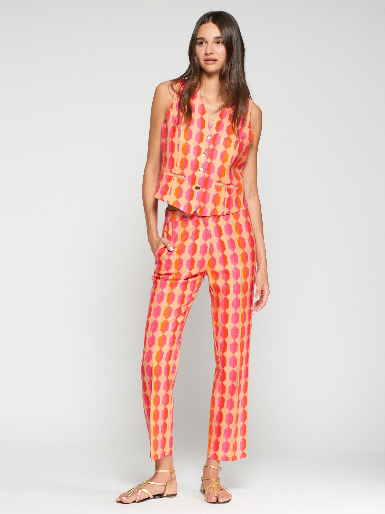PANTALÓN RECTO ESTAMPADO GEOMÉTRICO ROSA Y NARANJA