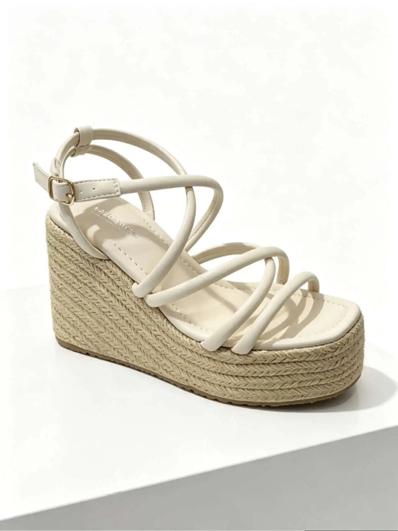 Sandalias cuña doradas y negras con tiras cruzadas