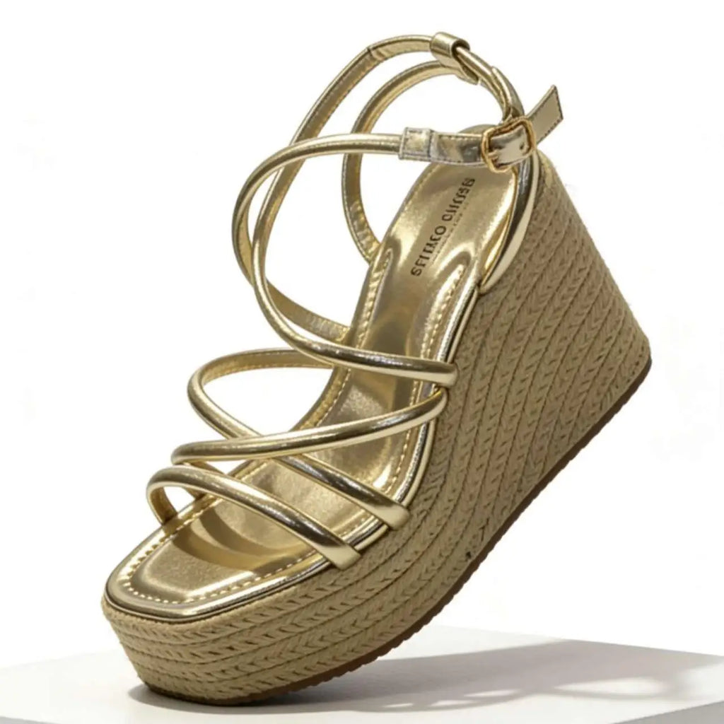 Sandalias cuña doradas y negras con tiras cruzadas