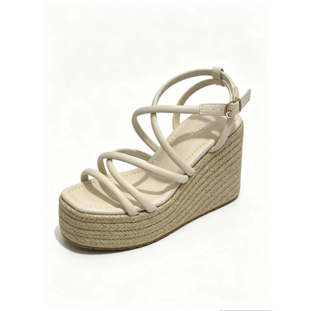 Sandalias cuña doradas y negras con tiras cruzadas
